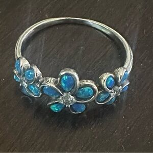 Silver .925 ring. Size 9. Gemstone unknown. Purchased at jewelry store in Hawaii